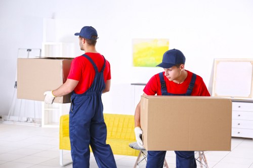 Removal team preparing items for a house move