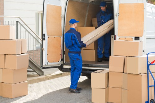 Professional removals team assisting a Kingston home move