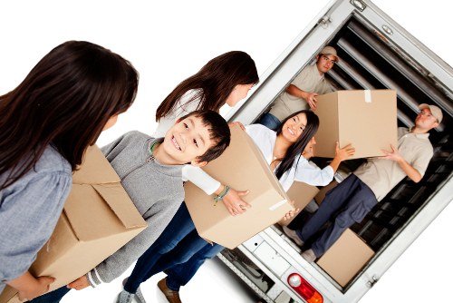 Moving truck parked in a Kingston neighborhood for a residential move
