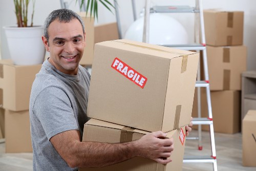 Removal team preparing a transparent quote for a Kingston property move