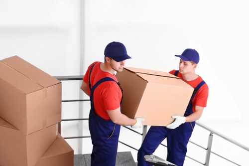 Professional flat removals in Kingston with moving team and van
