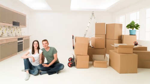Packed boxes and furniture arranged efficiently inside a removal van