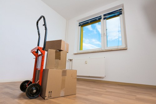 Local Kingston moving truck loading furniture and boxes