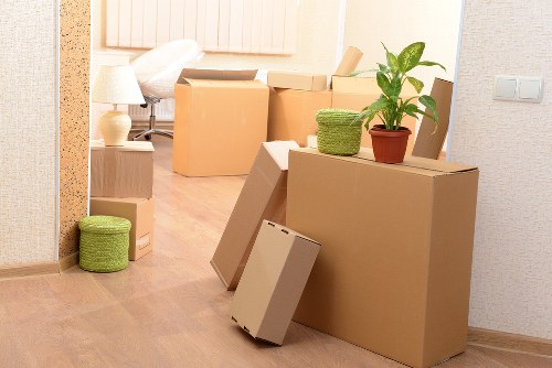 Kingston removals team packing fragile household items securely