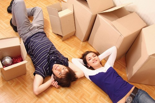 Manager assessing a moving company complaint with documents