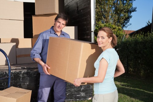 Customer discussing booking details for a removal service