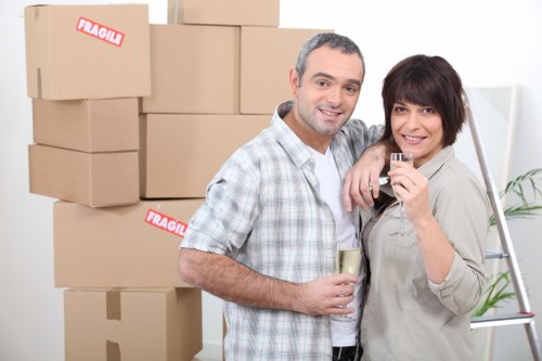 Urgent house move service in Kingston with packed boxes and van